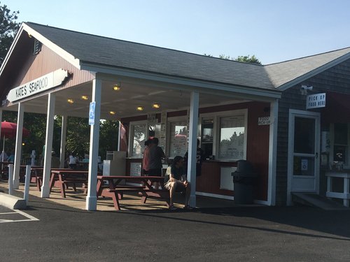 Kate's Seafood stand with picnic tables