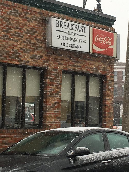 Diner sign: breakfast all day, bagels, pancakes, ice cream