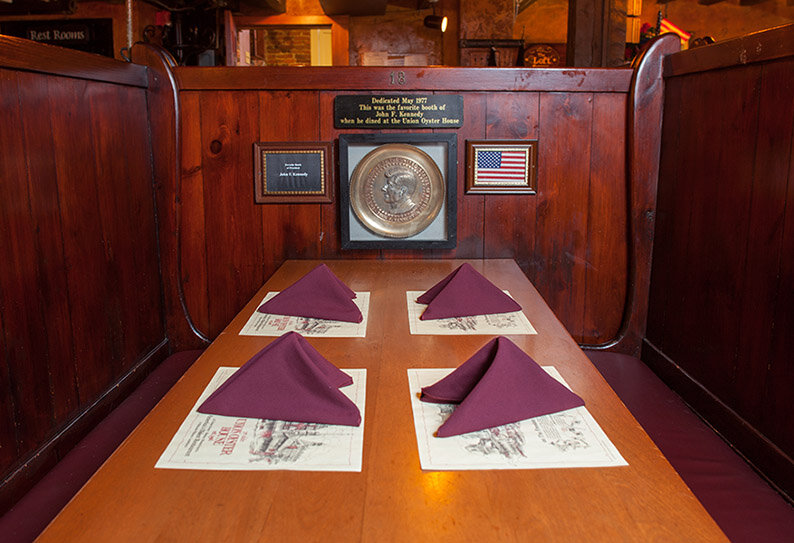 The Kennedy booth at the Union Oyster House, set for four