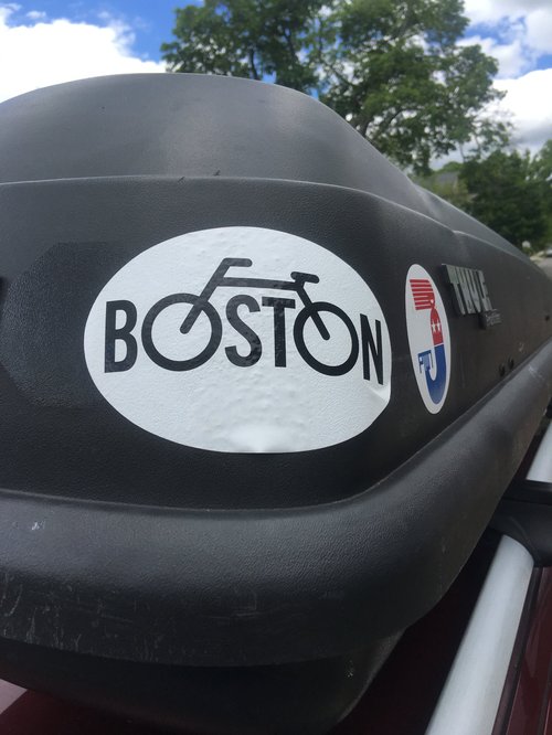 "Boston" bicycle sticker on a car roof box