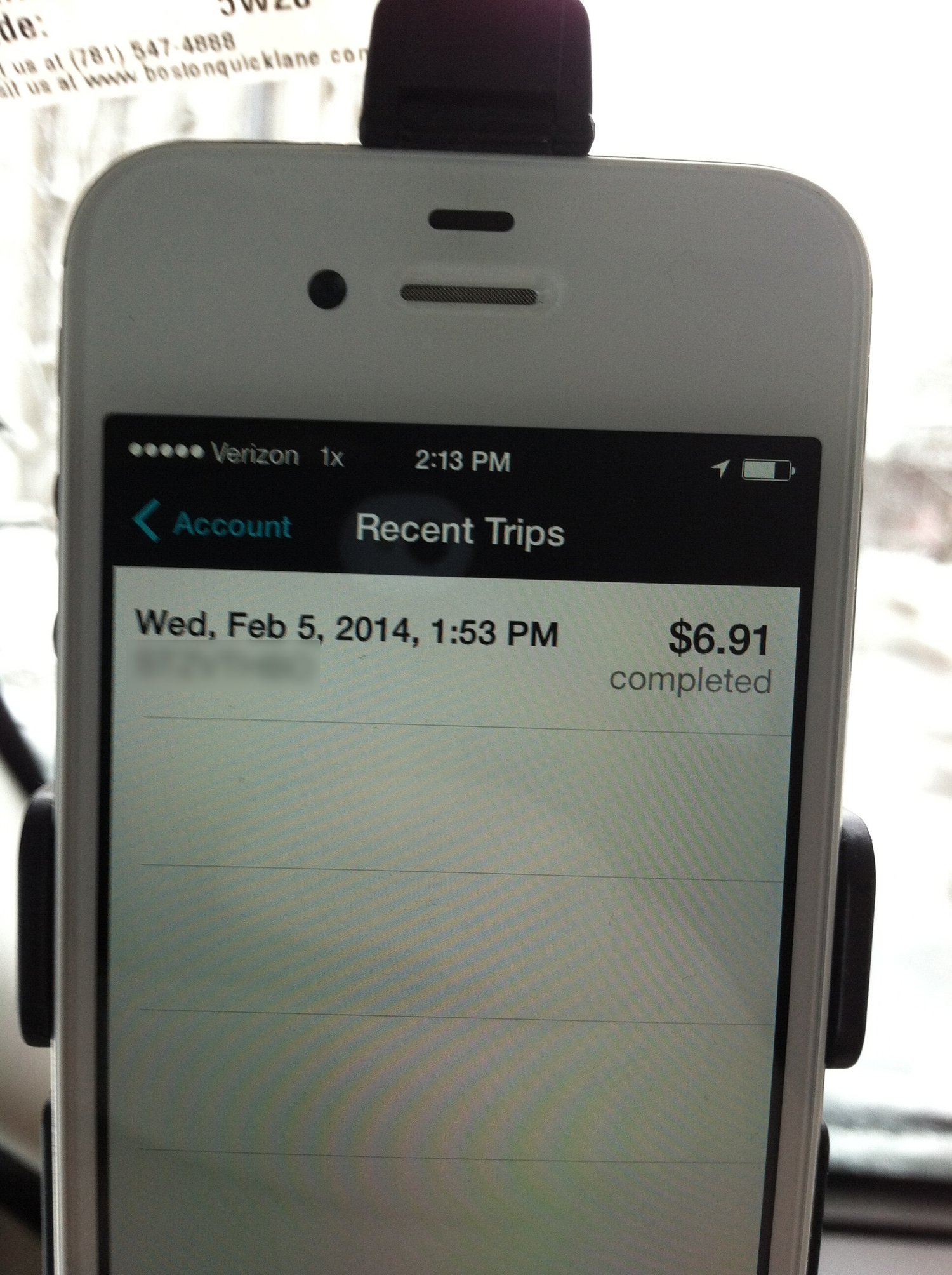 Uber app on a phone showing Jim's first completed trip, $6.91, February 5, 2014