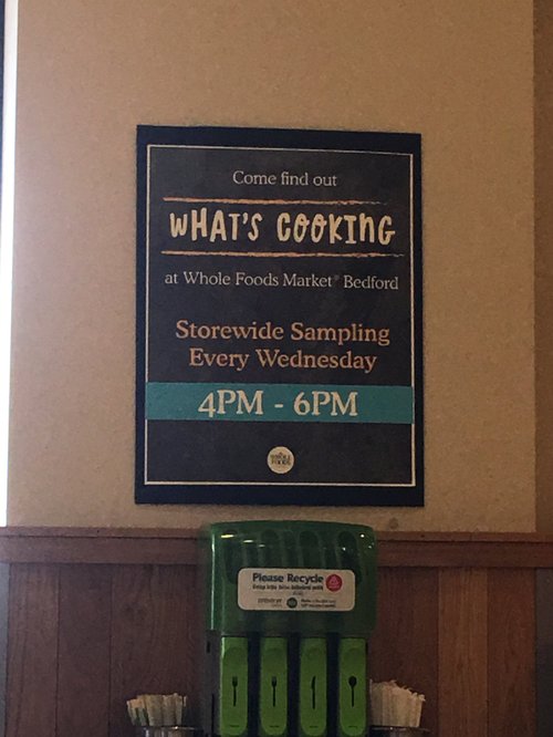Whole Foods Market Bedford sign for Wednesday storewide sampling