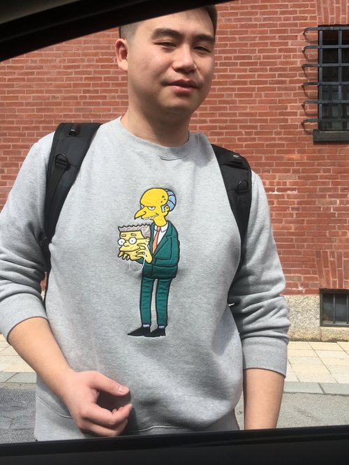Rider in a sweatshirt showing Mr. Burns from The Simpsons