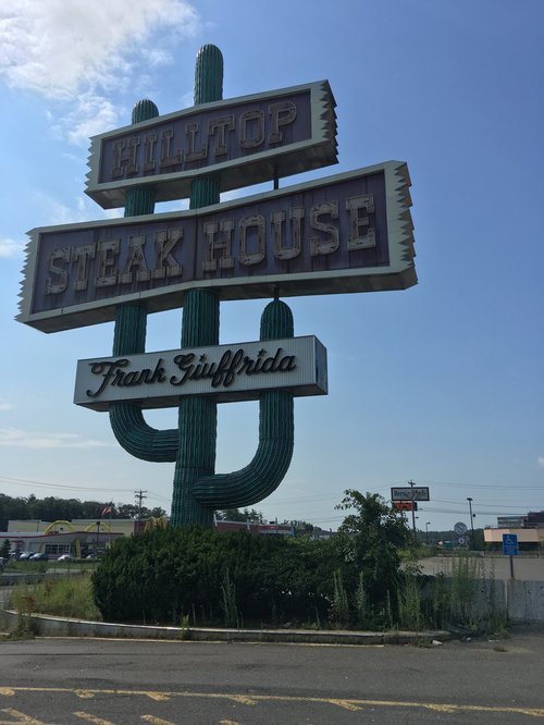 Hilltop Steak House cactus sign on Route 1