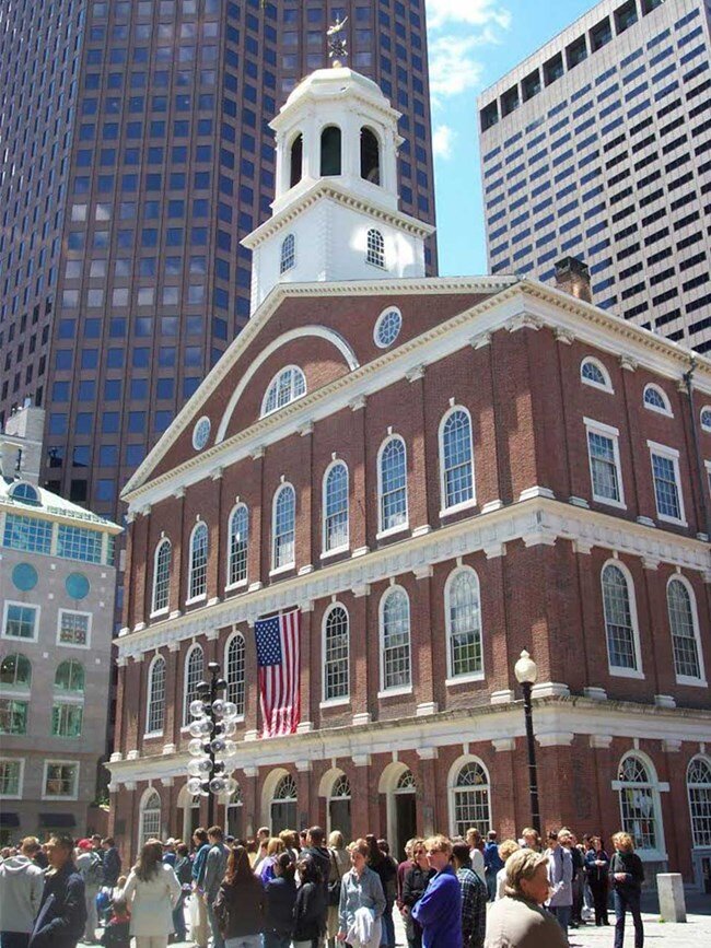 Faneuil Hall in Boston with a crowd outside
