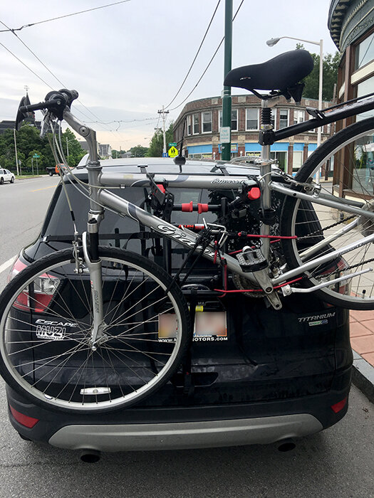 Bicycle on a rack on the back of an SUV