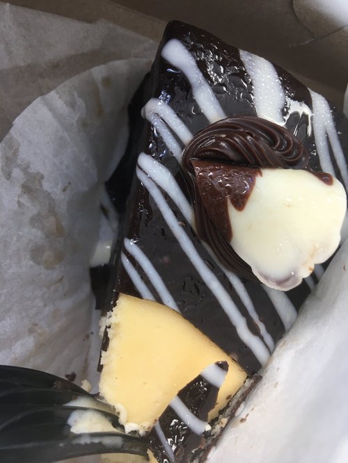 Slice of chocolate and cream cheese dessert