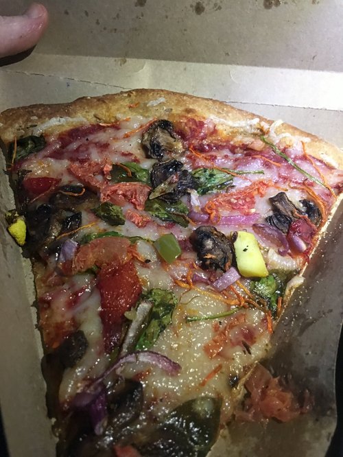 Slice of vegetable pizza