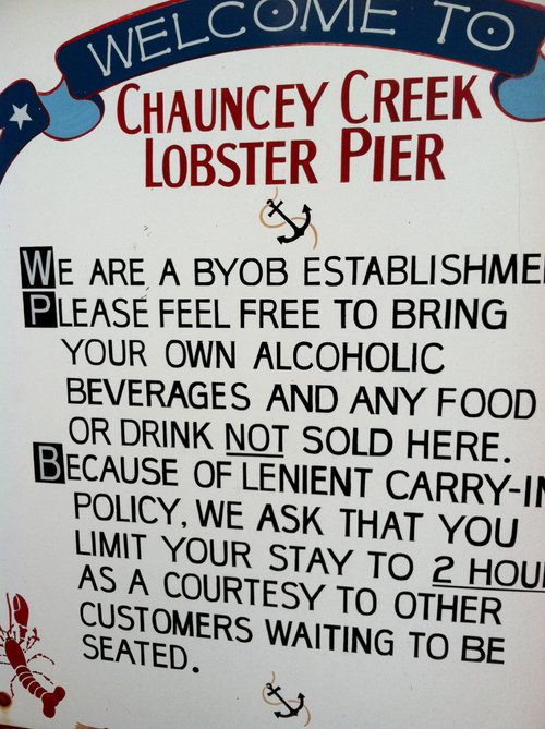"Welcome to Chauncey Creek Lobster Pier" BYOB sign
