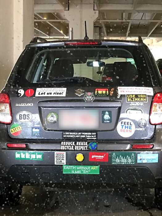 SUV covered in bumper stickers