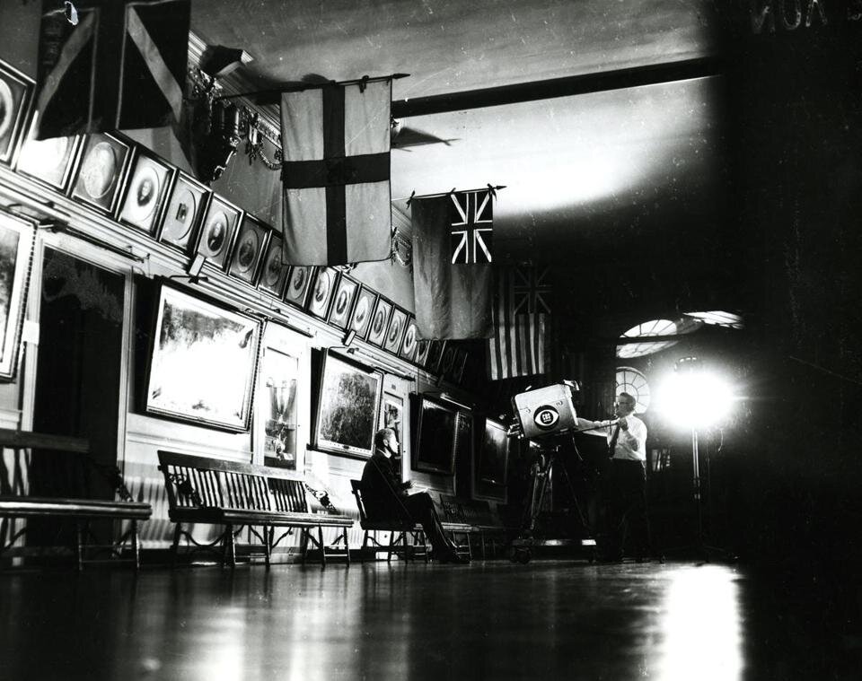 Nov. 7, 1960: Presidential candidate John F. Kennedy sat alone in a room off the main auditorium at Faneuil Hall before making the final campaign speech as the television technician from CBS set up the camera. From: “ The Final Stretch: John F. Kennedy’s 1960 Campaign ,” Boston Globe, 12/31/2012.