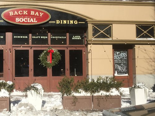 Back Bay Social restaurant with a Christmas wreath