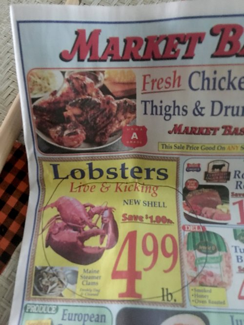 Market Basket flyer advertising live lobsters at $4.99 a pound