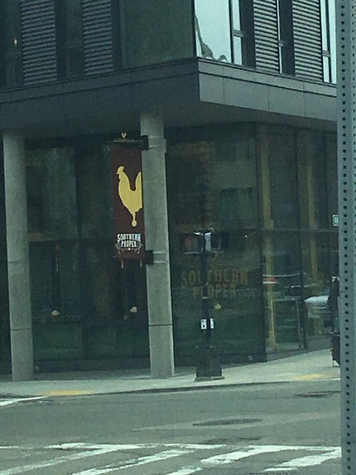 Southern Proper restaurant on a city corner